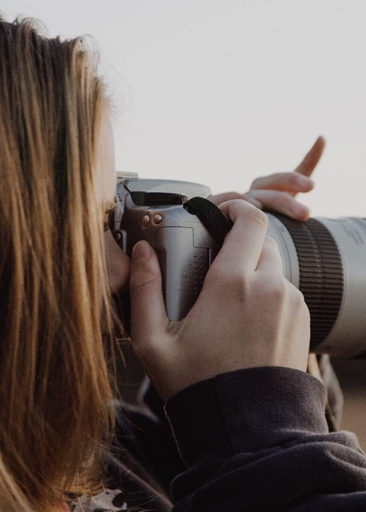 woman-taking-photos-731x1024